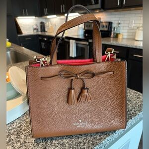 Kate Spade brown purse with red interior